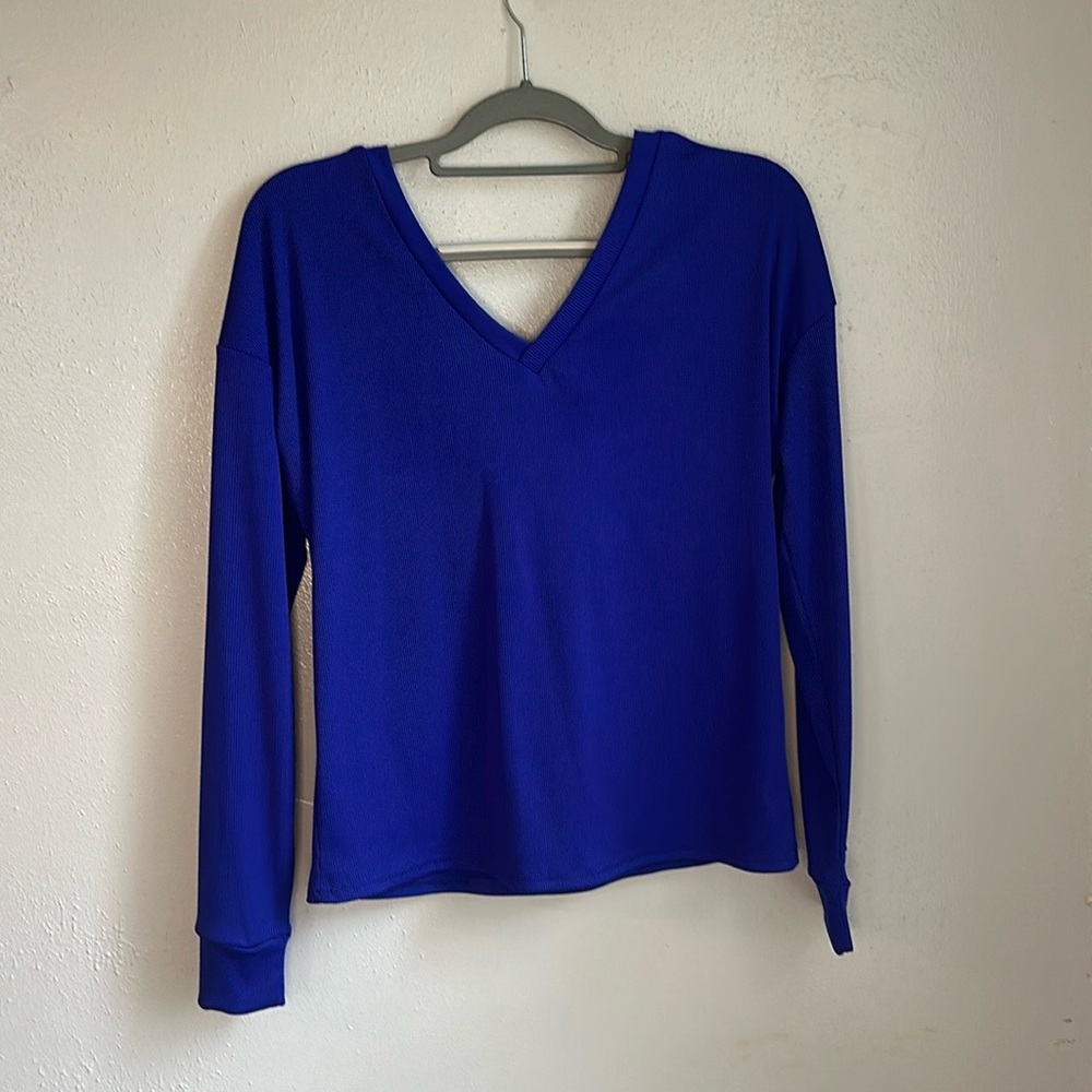Beautiful royal blue blouse with leopard tie in back